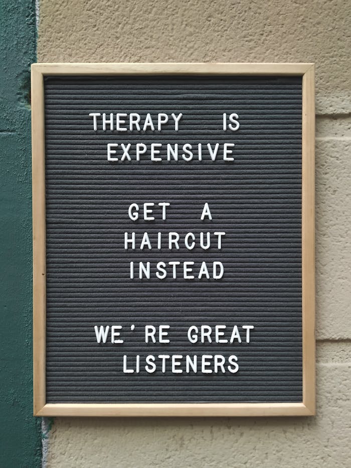 menu-01 Funny hair salon sign suggesting haircuts over therapy for listening.